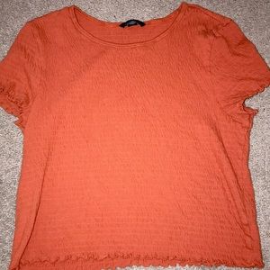 American Eagle orange shirt